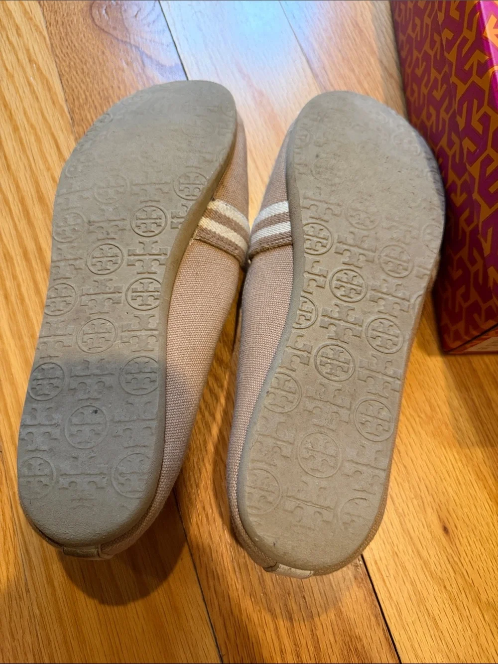 Tory Burch Tan Canvas Slip-Ons with Red Logo Medallions